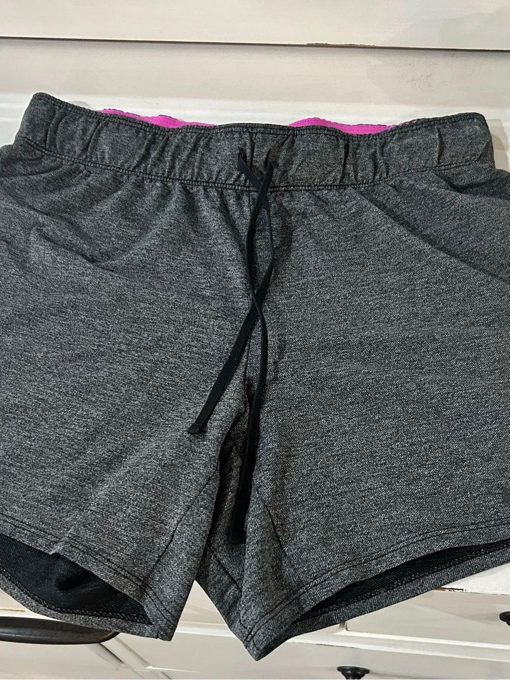 Nike Women's Gray Athletic Shorts with Pink Logo Waistband
